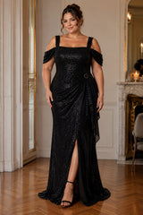 Front view of a plus size black evening dress with square neckline, off shoulder sleeves, gathered waist draping, sparkling finish and floor-length skirt.