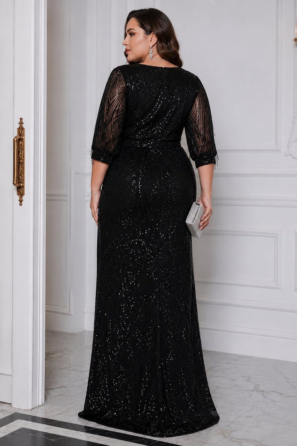 Back view of plus size black sequin evening maxi dress with three-quarter sleeves and sequin detailing