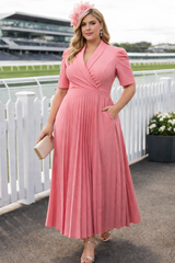 Plus Size Pleated Wrap Midi Dress in blush pink, suitable for wedding guests and daytime formal events like race day events