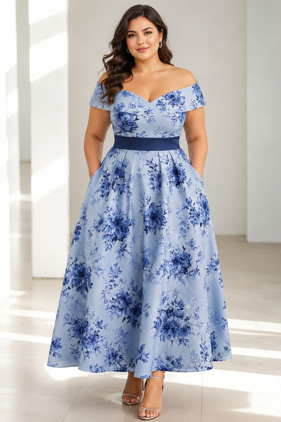 Front view of a blue floral plus size wedding guest dress with an off shoulder neckline and flowing midi skirt.
