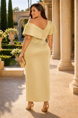 Plus size champagne gold off shoulder cocktail midi dress with puff sleeve back view