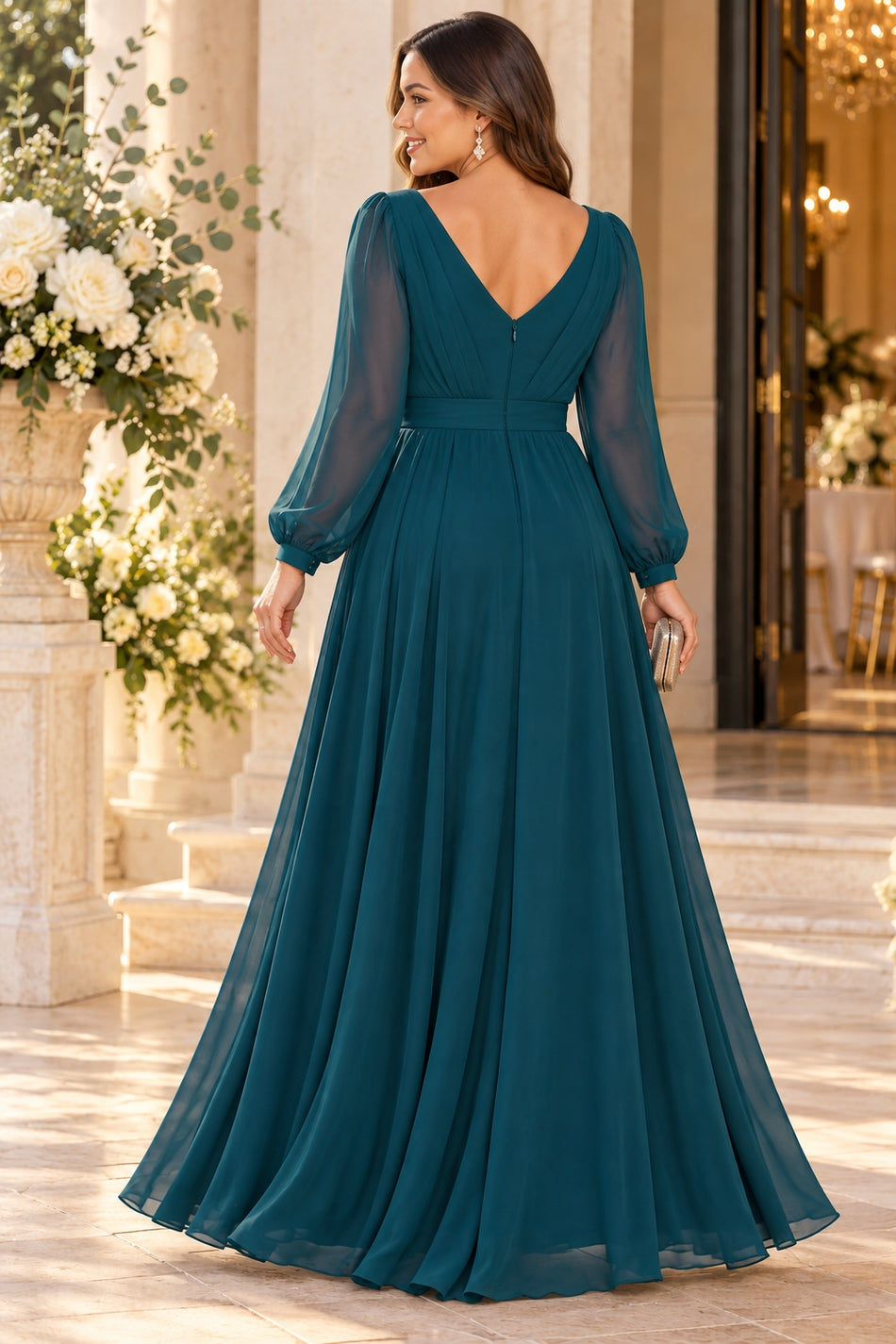 Back view of a teal formal maxi dress with sheer long sleeves, deep V back, defined waistband and flowing full-length skirt.