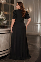 Plus size black evening maxi dress with draped V-neck bodice, puff sleeves and front split - back view