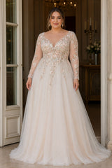 Front view of a plus size floral wedding dress with embroidered bodice, V-neckline, long illusion sleeves and flowing full-length skirt.