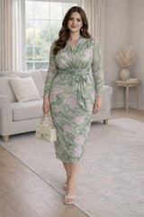 Plus Size Wedding Guest Midi Dress in green floral, with empire waist, pencil fit, suitable for weddings and formal events