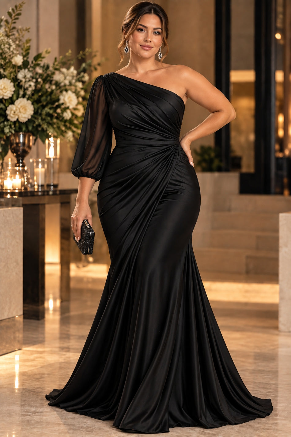 Plus size black one shoulder evening gown with sheer three-quarter sleeve and draped waist, front view.