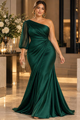 Plus size green one shoulder evening gown with sheer three-quarter sleeve and draped waist, front view.