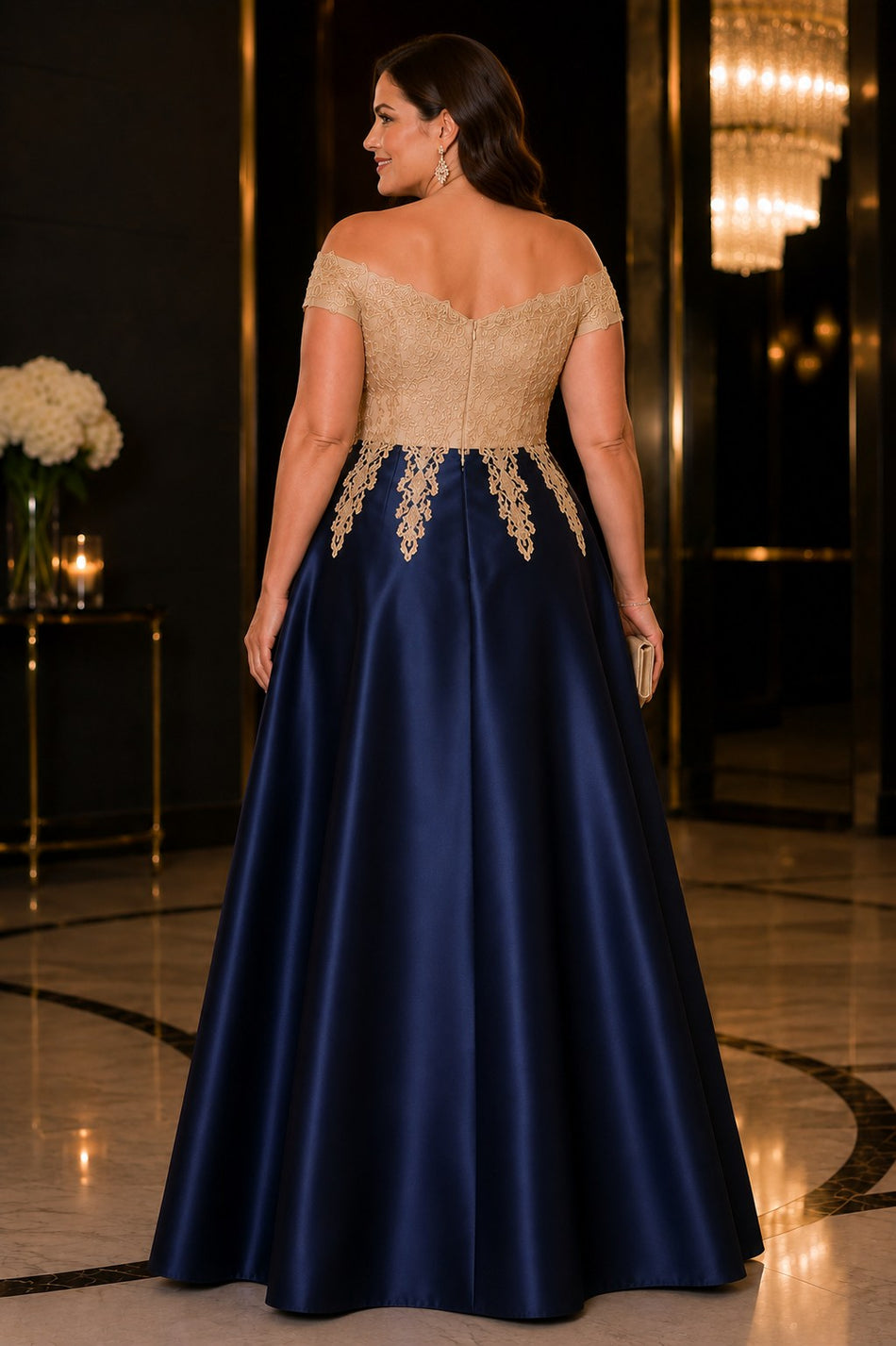 Back view of plus size navy evening dress with champagne lace off shoulder bodice and flowing A-line skirt