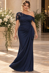 Plus size woman wearing a navy one shoulder evening dress with embellished lace, asymmetric neckline and draped waist.