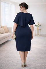 Back view of Plus Size Peplum Cocktail Dress in navy, suitable for cocktail events and formal occasions