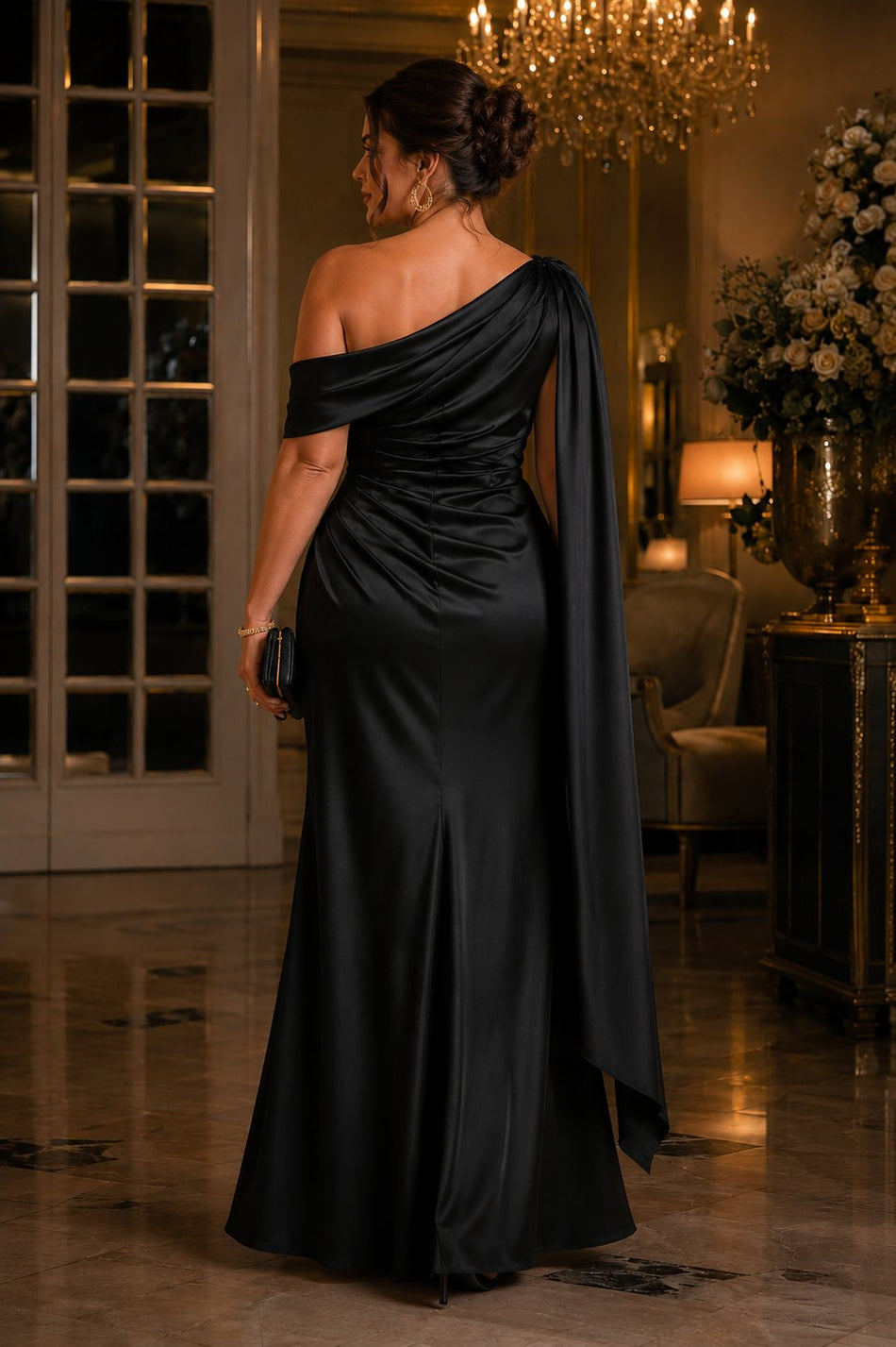 Plus size black one shoulder satin evening dress with cascading shoulder sash and elegant back detail, back view