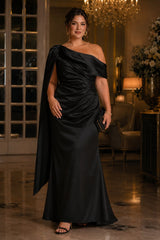 Plus size black one shoulder satin evening dress with draped waist and cascading shoulder sash, front view