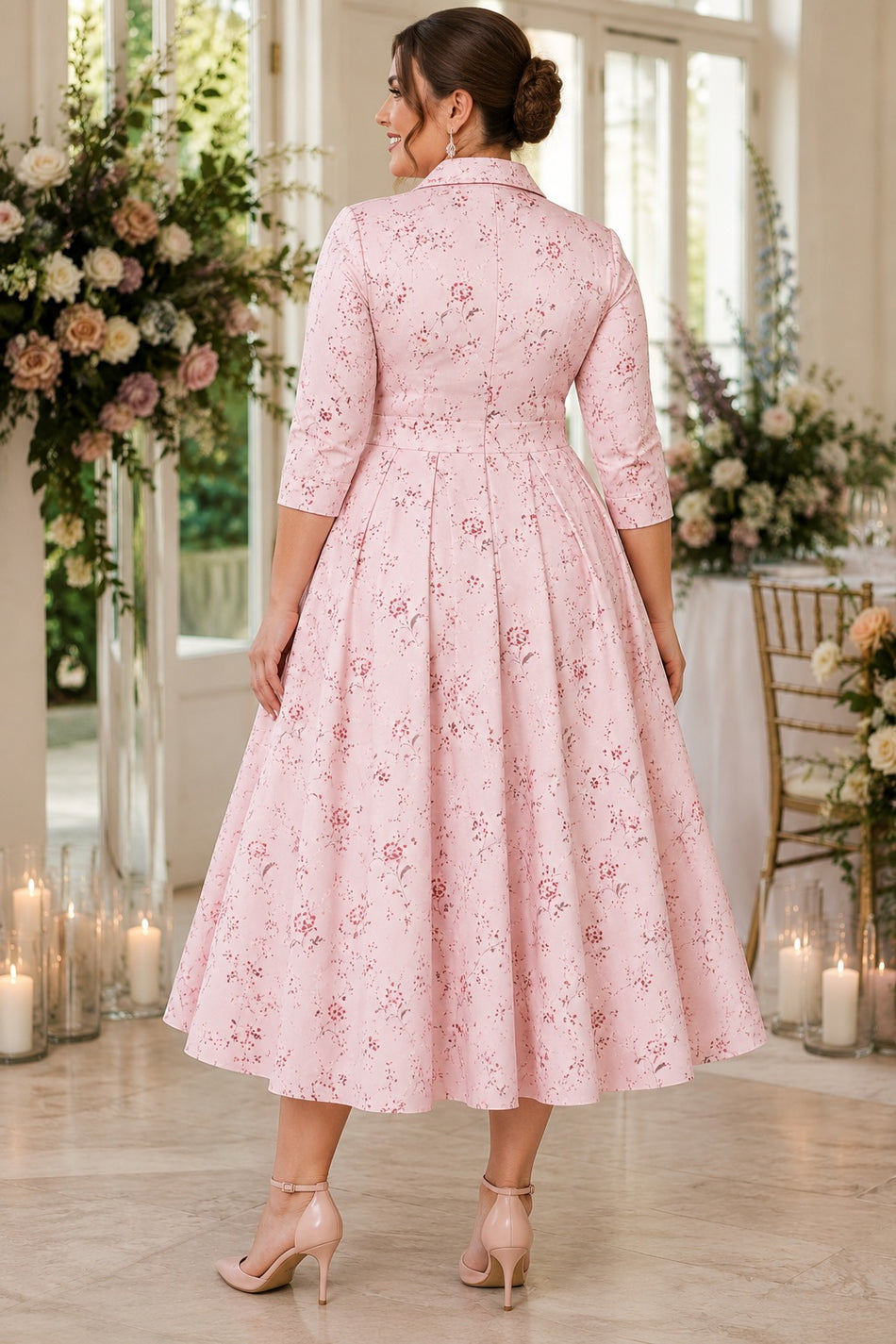 Plus size pink floral midi shirt dress with three-quarter sleeves and pleat A-line skirt