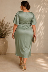 Plus size sage green wrap midi dress with flutter sleeves and draped waist detail back view