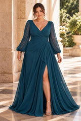 Plus size teal formal dress with V-neck, sheer long sleeves and flowing floor-length skirt, front view