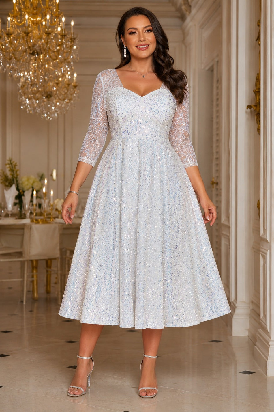 Plus size woman wearing a white sequin midi formal dress with sweetheart neckline, sheer three-quarter sleeves and full A-line skirt.