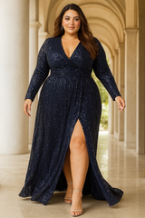 Woman wearing a plus size navy blue sequin gown with a high slit