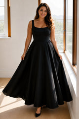 Romilly black plus size maxi dress with a square neckline, fitted bodice and flowing A-line skirt for formal occasions and evening events.