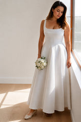 Romilly white plus size maxi dress with a square neckline and full A-line skirt, ideal for modern weddings and bridal celebrations.