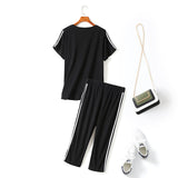 Tammy Plus Size Tracksuit Set: Knit Short Sleeve T Shirt Top and Capri Pants Set (Ready Stock XL - 1 Piece)